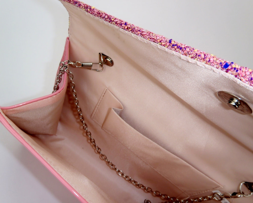 Pink glitter envelope clutch bag